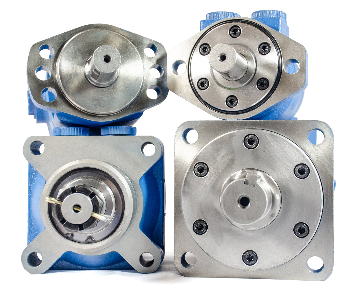 Four Metaris hydraulic orbital motors stacked on each other with different flanges.